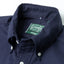 A navy button-down oxford button-down, white buttons, made in the USA, 100% cotton, green tag, vintage, stitched collar.