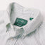 A close up photo of the blue striped button down collar, white buttons green Gitman Vintage tag.