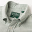 A close up photo of the green button down collar, white buttons green Gitman Vintage tag.