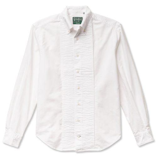 A classy formal white button down tuxedo shirt oxford, with white buttons, a ruffled placket and barrel cuffs.