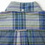 The back of the Tan/Blue Archive Madras with a locker loop and button on the back of the collar.