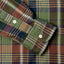 The barrel cuffs on the sleeve of the Brown Archive Indian Madras with white buttons.