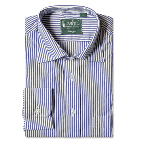 The Navy Bengal Stripe Dress Shirt with a medium spread collar and mother of pearl buttons on a lined placket.
