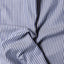 The texture of the fabric on the Navy Bengal Stripe Dress Shirt.