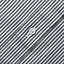 A closeup of the mother of pearl button on the lined placket.