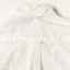 The back of White Ultralight Oxford shirt with a locker loop and back button on the collar.