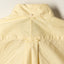 The back of Yellow Ultralight Oxford shirt with a locker loop and back button on the collar.