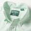 A close-up of the button down collar.