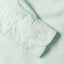The sleeve of the Celeste Spring Oxford  with two white buttons.
