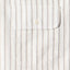 The button through flap pocket.