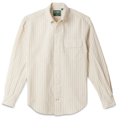 The Tan Striped Japanese Oxford shirt, with a front pocket and white buttons on a stitched placket.