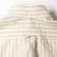 The back of the Tan Striped Japanese Oxford with a locker loop and a button on the back of the collar.
