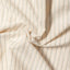 The texture of the fabric on the Tan Striped Japanese Oxford.