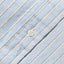 A white button on the stitched placket.