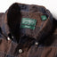 A close-up of the Brown Checked Organic Cotton shirt collar.