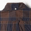 The back of the Brown Checked Organic Cotton shirt with a locker loop and button on the back of the collar.