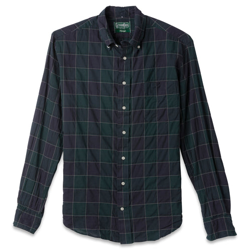 The Navy Checked Organic Cotton  button down shirt, with a front pocket and white buttons on a stitched placket.