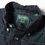 A close-up of the Navy Checked Organic Cotton shirt collar.