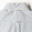 The back of the White Organic Cotton Dobby Stripe shirt with a locker loop and button on the back of the collar.