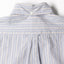 The back of the Blue Organic Cotton Dobby Stripe shirt with a locker loop and button on the back of the collar.
