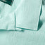 The top button loop on the collar.