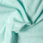 The texture of the fabric on the Teal Dobby Stripe Chambray Camp Shirt.