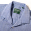 A close-up of the camp collar on the Blue Dobby Stripe Chambray Camp Shirt.