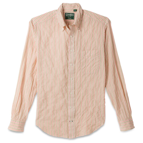 The Tan Awning Stripe shirt, a stitched placket with barrel cuffs and a front pocket with white buttons.