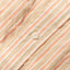 A close-up of the white button on the stitched placket.
