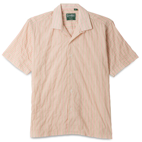 The Tan Awning Stripe Camp Shirt, with short sleeves  and white buttons on the front.