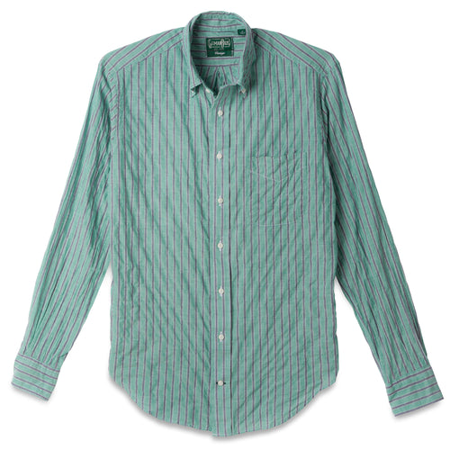 The Green Awning Stripe shirt, a stitched placket with barrel cuffs and a front pocket with white buttons.