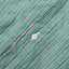 The white button on the front of placket.