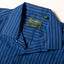 A close-up of the camp collar on the Indigo Awning Stripe Camp Shirt.