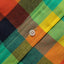 The lined placket with a white button.