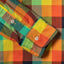 The cuff on the sleeve of the Checker Archive Madras with two white buttons.