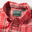 A close-up of the button down collar.