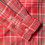 The unlined cuff on the Jamaican Bandana Madras with two white buttons.