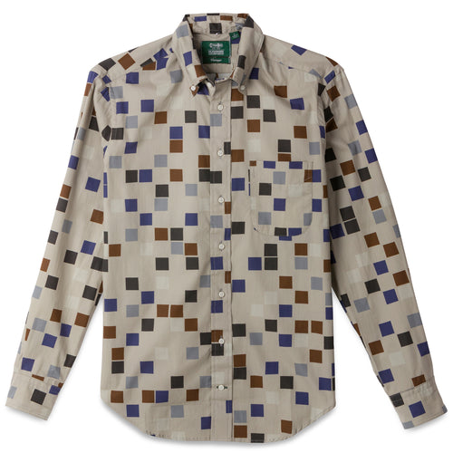 The Alexander Girard Brown "Small Squares" shirt is our collaboration with the estate of Alexander Girard and features a front pocket and white buttons with barrel cuffs. 