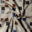 The texture of the fabric on the Alexander Girard Brown 