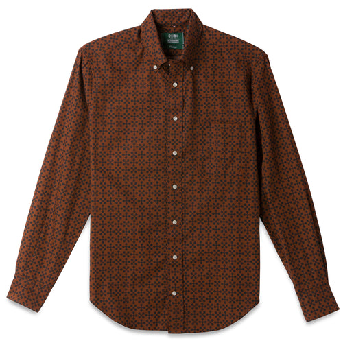 The Alexander Girard Brown "Jacks" shirt is our collaboration with the estate of Alexander Girard and features a front pocket and white buttons with barrel cuffs. 