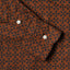 The barrel cuffs with two white buttons on the sleeve.