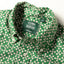 A close-up of the button down collar.