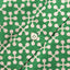 The white button on the stitched placket.
