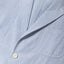 The lapel of the Blue Stripe Seersucker Simple Jacket with a front pocket.