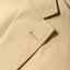 The upper lapel with a button hole.