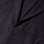 The lapel of the British Hopsack Simple Jacket with a front pocket.