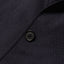 A close-up of the button on the British Hopsack Simple Jackets fabric.