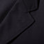 The upper lapel with a button hole.