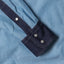 The pearl snap buttons on the cuff and sleeve of the Nicholas Daley Chambray Western shirt.