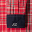 The stitched placket with Pearl snap buttons and ND embroidered on the sleeve.